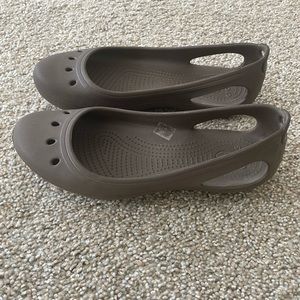 Brown Crocs Flats. Size 9.